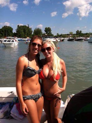 Busty Blonde Boat Babe Brings Bovine Beverages By Backyards Brunette