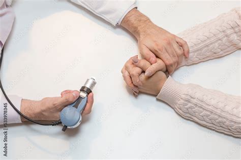 Systemic sclerosis diagnosis concept, hands of a doctor and a patient ...