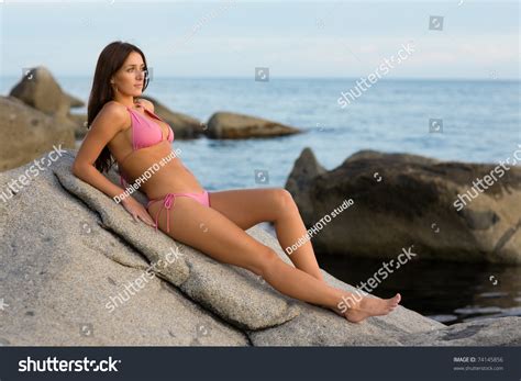 Sexy Brunette Girl Lying On Rocks Stock Photo Shutterstock