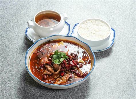 Authentic Chinese Cuisine. Savor a Vibrant, Spicy Beef Soup Served with ...