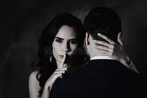 Portrait Of Tempting Brunette Lady Showing Silence Sign With Forefinger