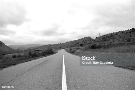 Asphalt Road With Continuous White Line Stock Photo Download Image