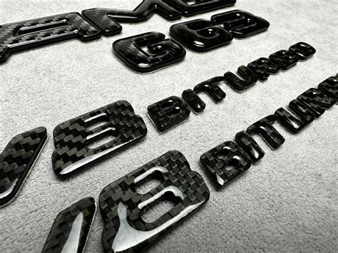 Amg V Biturbo G Emblem Set Metal Black And Carbon