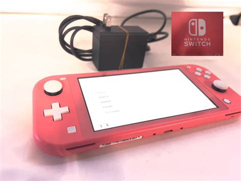 【やや傷や汚れあり】【0806 12】 任天堂スイッチ 本体 Nintendo Switch 動作確認済 初期化済 ピンク 充電コード付きの