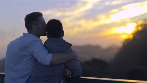 Gay Couple Watch Sunset From Stock Footage Video 100 Royalty Free 12622820 Shutterstock
