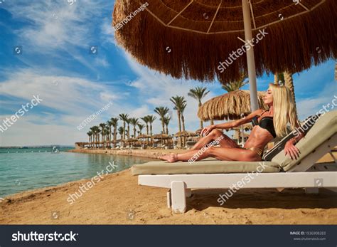 Sexy Woman Wearing Bikini Sitting On Stock Photo 1936908283 Shutterstock
