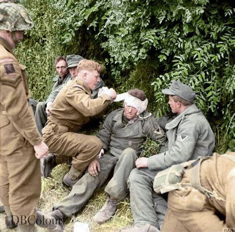 A Stretcher Bearer Of The Durham Light Infantry Th Division Attends