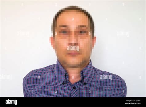 Portrait Of A Man With Pixelated Face In An Concept Of Anonymity Or