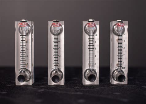 liter per minute to kg/s