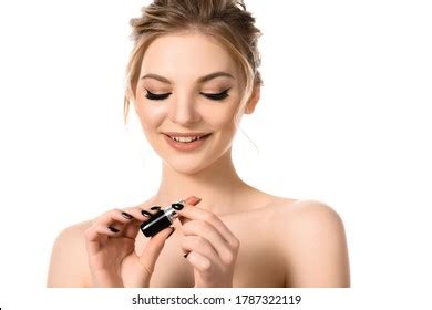 Smiling Naked Beautiful Blonde Woman Holding Stock Photo
