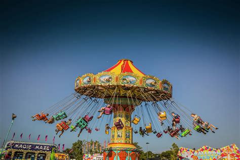 Carousel Swings At The Fair Photograph By Don Johnston Fine Art America