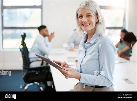 Making Sure Shes Updated With Her Digital Calendar Portrait Of A Confident Mature Businesswoman