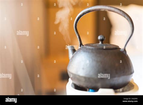 Metal Chinese Teapot Steaming Stock Photo Alamy