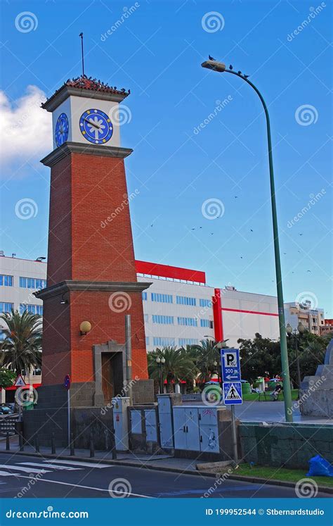 Clock Tower Surrounding Park Buildings Outside Mercado Del Puerto