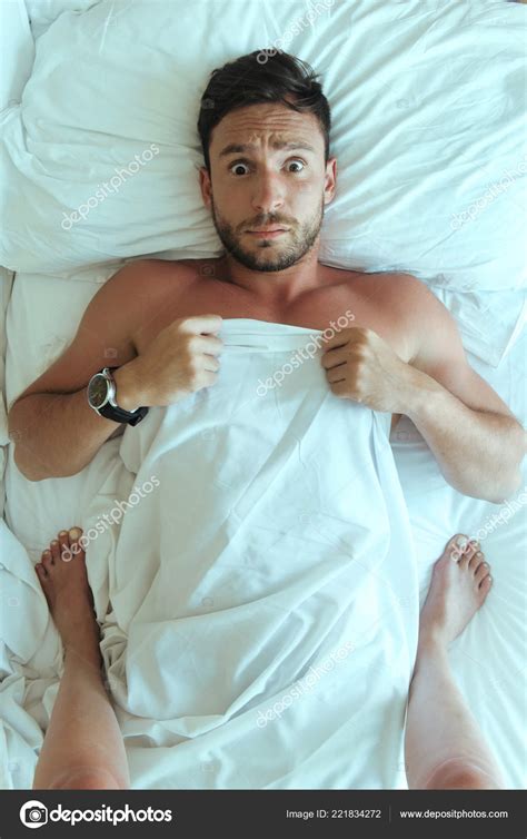 Handsome Man Laying Naked Bedroom Surprised His Girlfriend Standing Him Stock Photo By