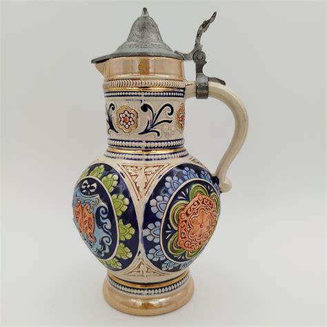 Пивной кувшин с рельефным цветным декором, керамика, глазурь, люстр ...