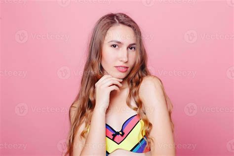 Adorable Brunette In Bikini Posing On Pink Background Stock