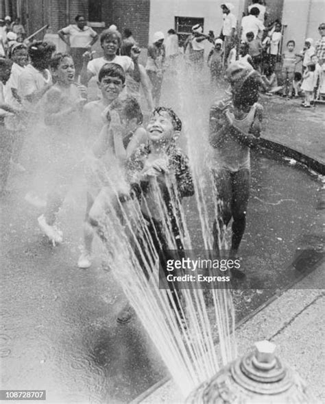 Fire Hydrant Kids Photos And Premium High Res Pictures Getty Images