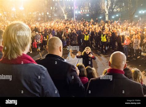 Riga Latvia Lacplesa Day A Crowd With Lit Candles Gathers Around A