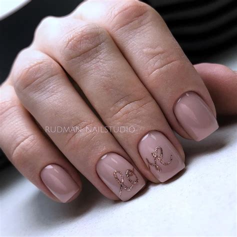 Rose Gold Nude Nails With Glitter Love Print In Amazing Trendy Design
