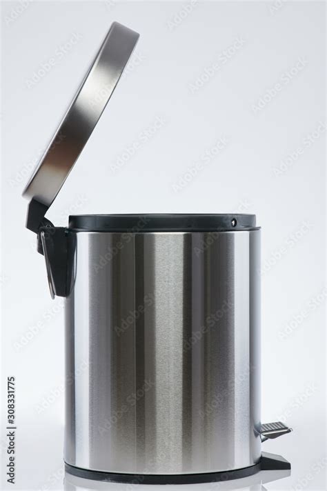 Open steel trash bin Stock Photo | Adobe Stock