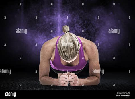 Composite Image Of Muscular Woman Doing Push Ups Stock Photo Alamy