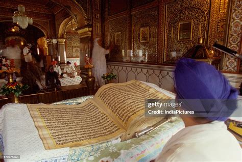 Hand Written Guru Granth Sahib In Golden Temple Amritsar Punjab