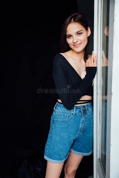 Brunette Woman And Standing At The Door From The Room Stock Image Image Of Charming Glamour