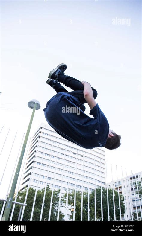 Man Jumping Over Fence In City Hi Res Stock Photography And Images Alamy