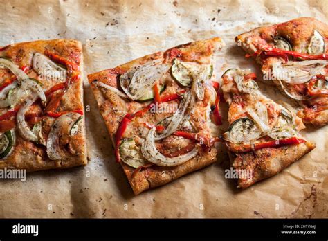 Vegetable Pizza With Onions Peppers And Courgette Stock Photo Alamy