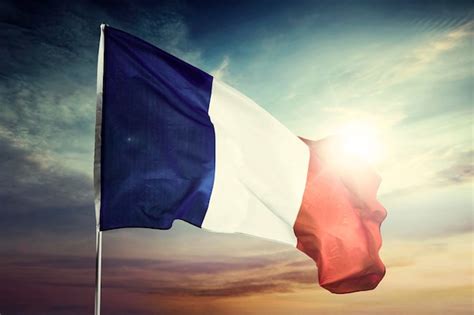 Premium Photo France Flag Waving At Sunrise Time