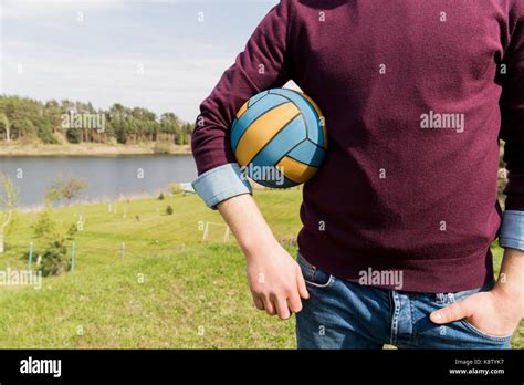 Man Holding Ball Stock Photo Alamy