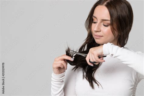 trim hair separated dry ends hair care problems closeup portrait