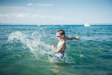 5860 Laughing Splashing Stock Photos Free And Royalty Free Stock