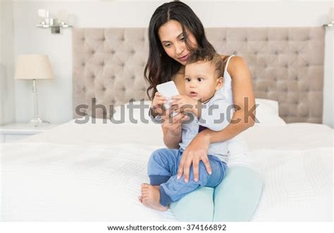 Happy Brunette Holding Her Baby Using Stock Photo 374166892 Shutterstock
