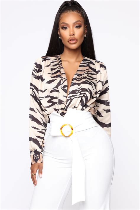 Amara La Negra Sizzled in a Animal Print Bodysuit From Fashion Nova