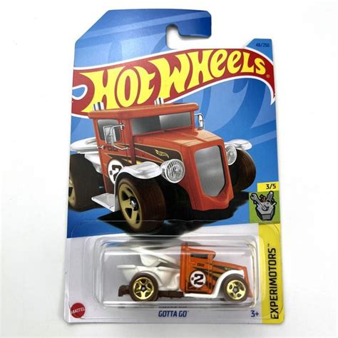 Машинка Hot Wheels коллекционная оригинал 2023 GOTTA GO ORANGE купить с доставкой по