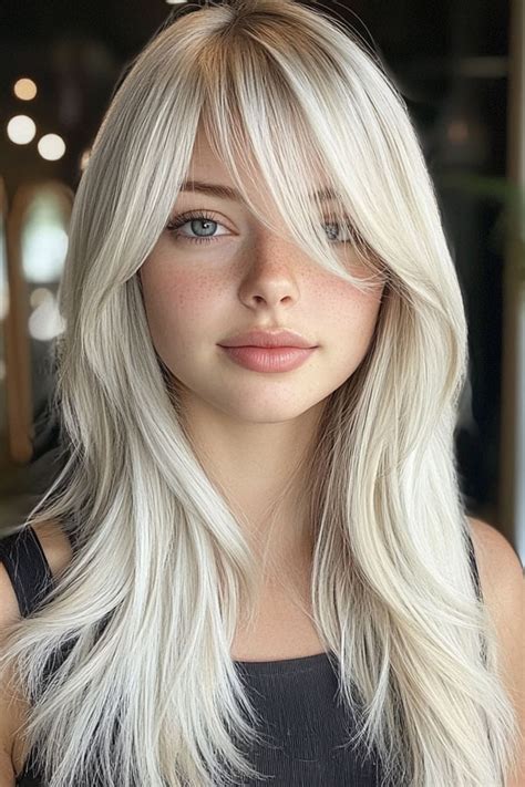 35 Trendy Long Straight Haircuts To Try Now Icy Platinum Layers With Side Swept Bangs