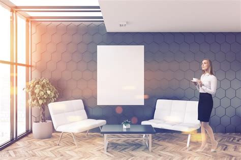 Premium Photo Blonde Busineswoman In A Gray Honeycomb Wall Pattern Office Lounge With Loft