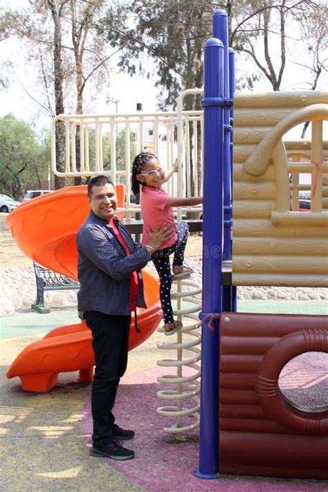 Divorced Dad With His Year Old Brunette Latina Daughter Play In The Park Games And Spend