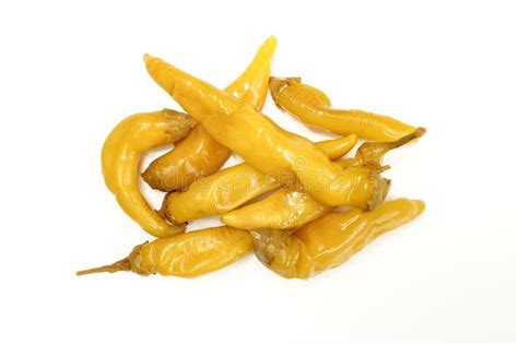 Hot Yellow Peppers In Opened Jar Isolated On White Surface Top View Stock Photo Image Of