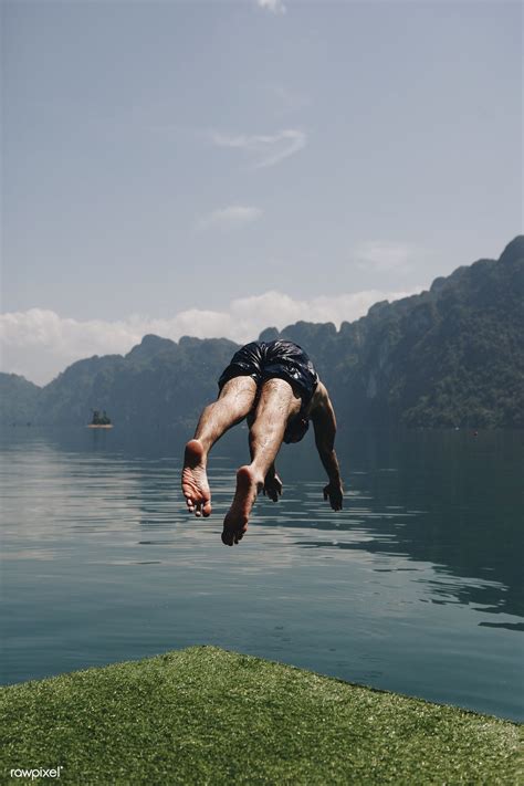 Man Diving Into The Water Premium Image By Diving