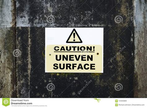 Uneven Road Surface Caution Sign In Construction Building Site Stock