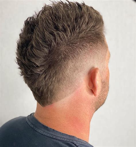 15 Lit Faux Hawk Fade Haircuts For Guys In 2021 Faux Hawk Hairstyles