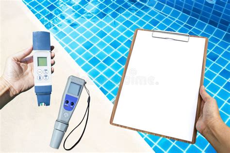 Digital Water Tester With Blank Paper Clipboard Over Clear Swimming