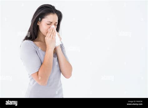 Sick Brunette Blowing Her Nose Stock Photo Alamy