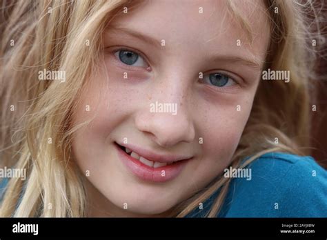 Closeup Of A Smiling Beautiful Innocent Blonde Teenage Girl Stock Photo Alamy