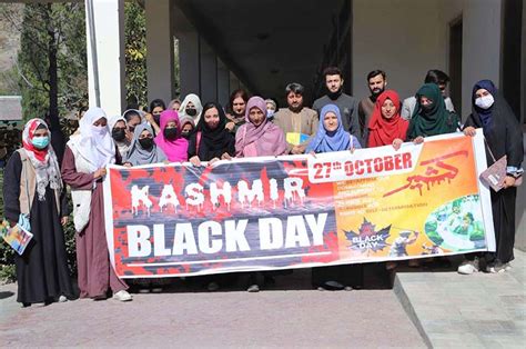 Karakoram International University Students Participating In A Rally To