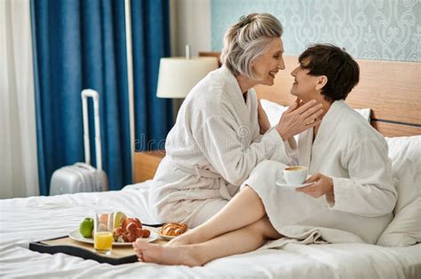 A Senior Lesbian Couple Sits Tenderly Stock Photo Image Of Partnership Harmony 316449814