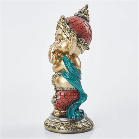 Buy Alpana Polyresin Baby Ganesha With Flute Figurine From Home Centre